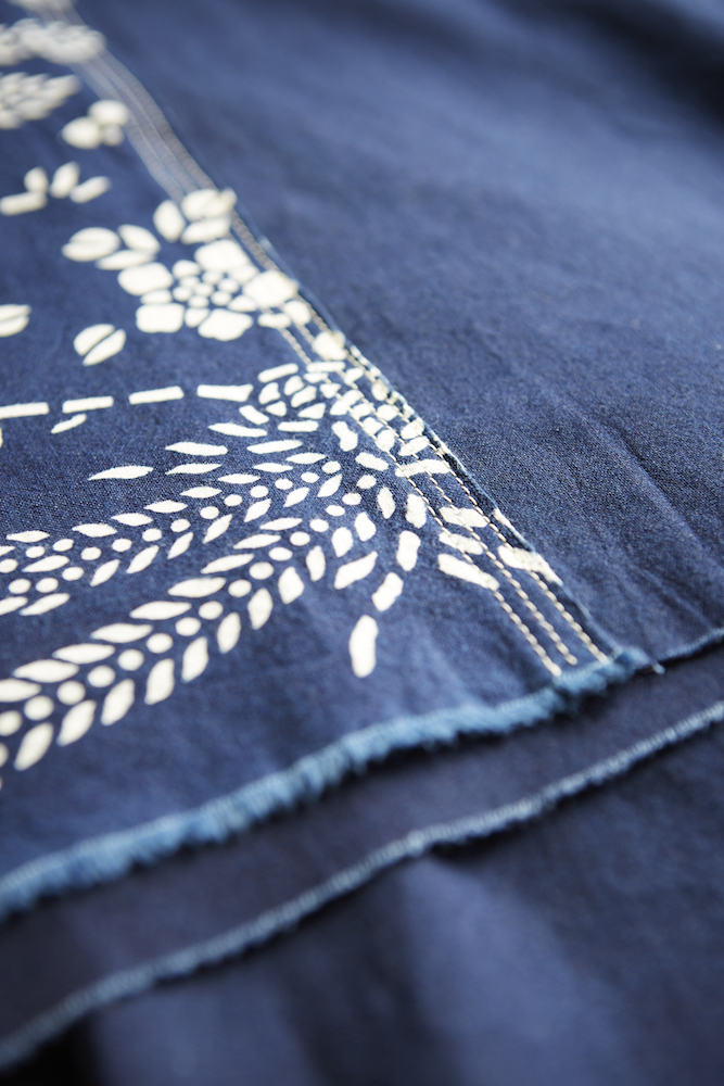 Natural hand dyed indigo bed cover with Phoenix pattern on solid indigo bedding bed cover hand made artisanal natural indigo home decoration interior decoration bedroom design blue and white