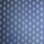 natural artisanal hand dyed blue and white indigo cotton fabric textile geometric diamond dot pattern