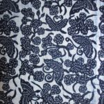 natural artisanal hand dyed blue and white indigo cotton fabric textile floral butterfly pattern