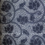 natural artisanal hand dyed blue and white indigo cotton fabric textile floral pattern