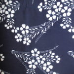 natural artisanal hand dyed blue and white indigo cotton fabric textile floral pattern