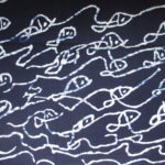 natural artisanal hand dyed blue and white indigo cotton fabric textile fish pattern