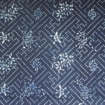natural artisanal hand dyed blue and white indigo cotton fabric textile traditional pattern