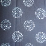 natural artisanal hand dyed blue and white indigo cotton fabric textile geometric round dragon pattern