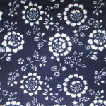 natural artisanal hand dyed blue and white indigo cotton fabric textile floral pattern