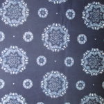 natural artisanal hand dyed blue and white indigo cotton fabric textile geometric floral pattern