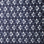 natural artisanal hand dyed blue and white indigo cotton fabric textile geometric floral leaf pattern
