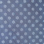 natural artisanal hand dyed blue and white indigo cotton fabric textile geometric floral pattern