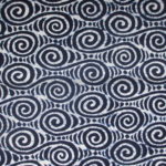 natural artisanal hand dyed blue and white indigo cotton fabric textile geometric wave pattern