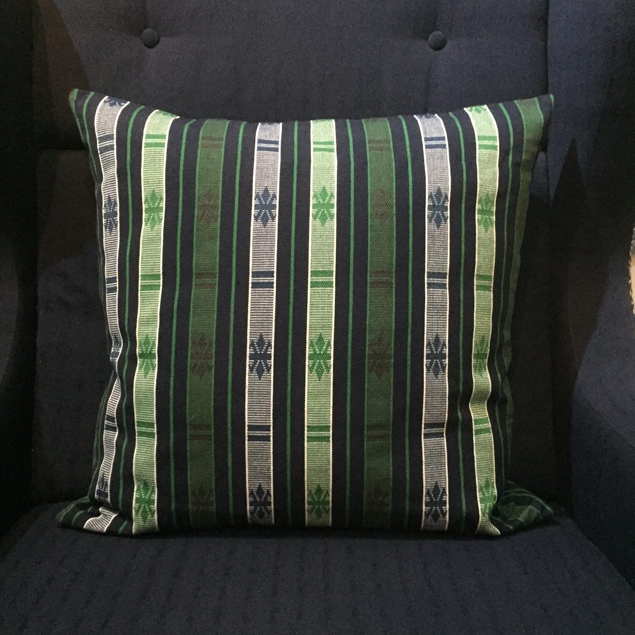 Philippine hand loomed fabric with stylised butterfly stripe tribal pattern in navy, green and white hand loomed artisan hand made woven traditional tribal fabric textile stipe cushion home decoration interior design