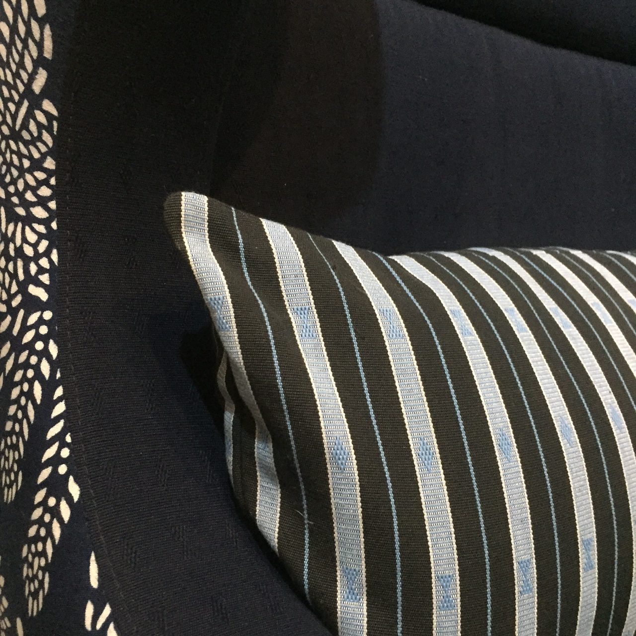Philippine hand loomed fabric with striped blue and grey mortar and pestle tribal pattern hand loomed artisan hand made woven traditional tribal fabric textile stipe cushion home decoration interior design