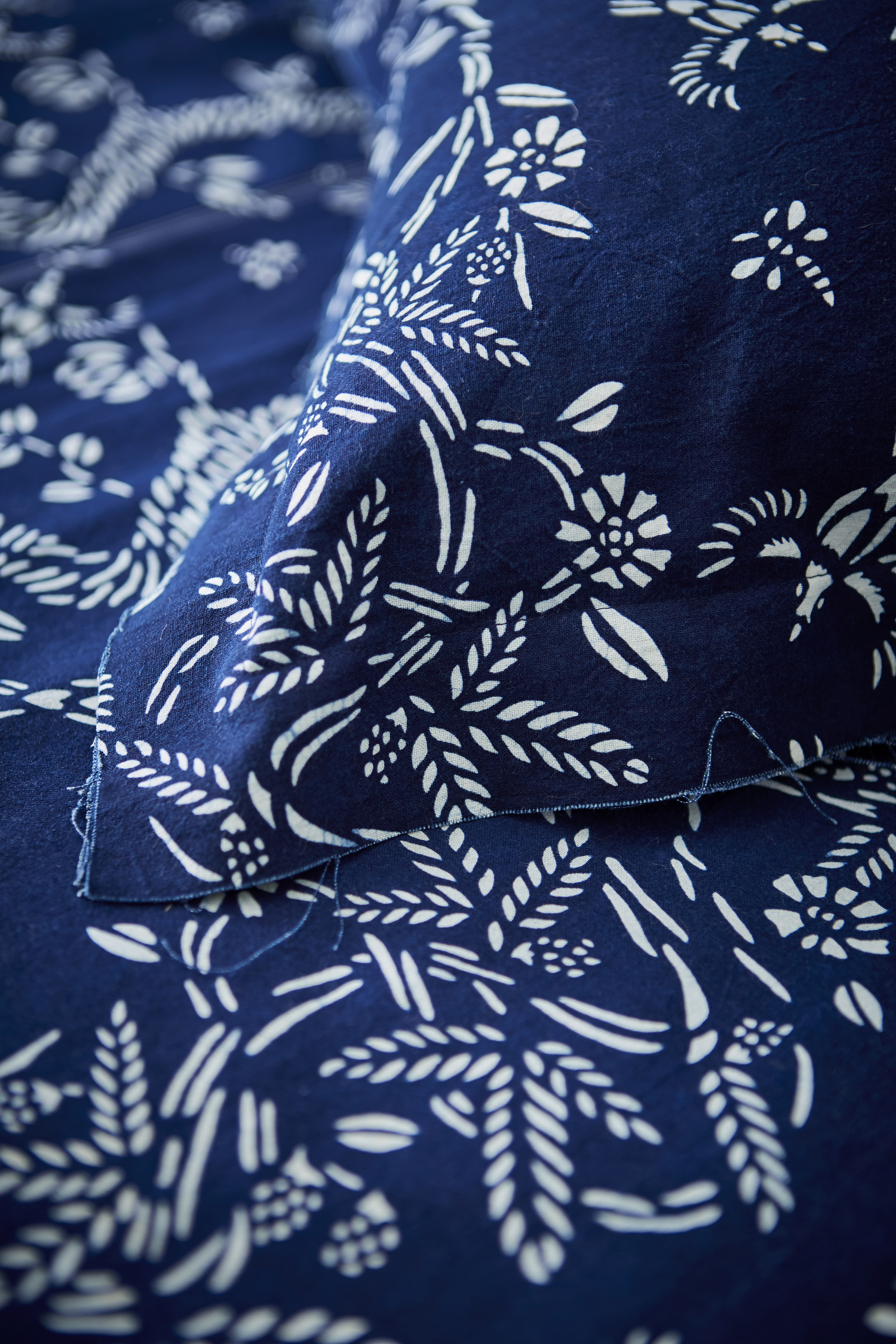 birds&bees sham detail birds&bees fabric textile artist collaboration Alexandra McKenzie blue and white artisanal natural handmade indigo pattern sham home bedroom interior decoration design sustainable ethical living slow deco living flora and fauna motif